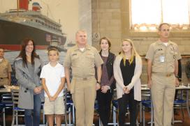 CAPT Palmer and family during award ceremony CAPT Palmer and family during award ceremony